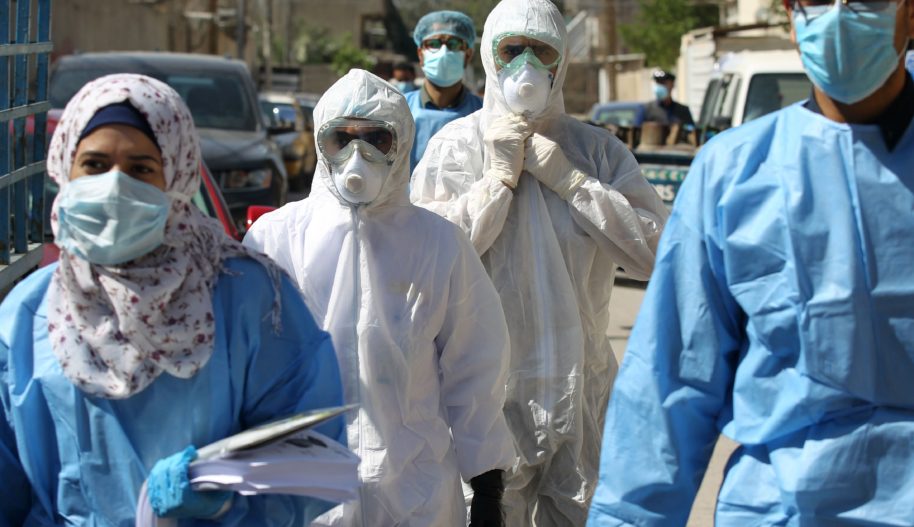 Iraqi public hospital specialised doctors gather in a street